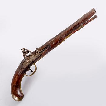 An 18th Century flintlock pistol.