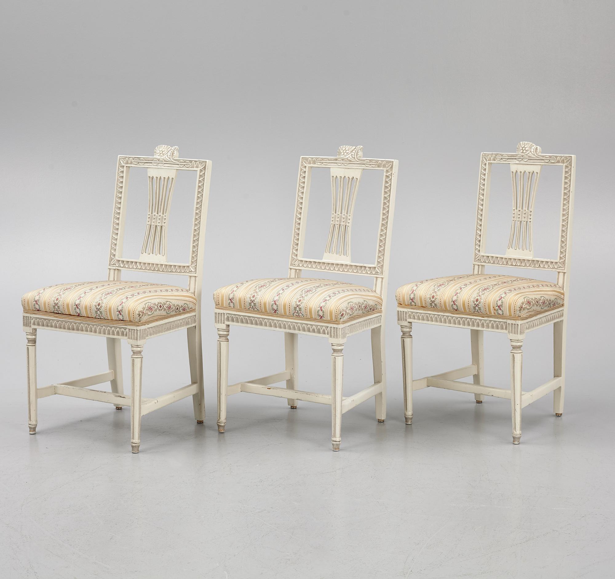 A sofa, three chairs and a table, Gustaivan style and of the Gustavian period, 19th-20th century.