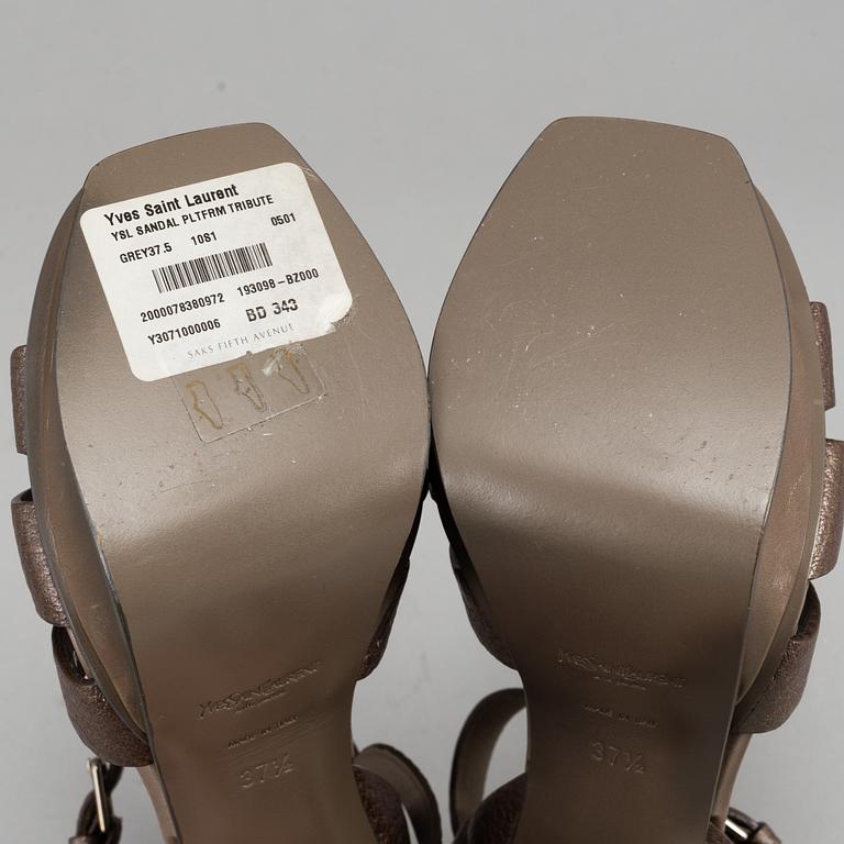 YVES SAINT LAURENT, a pair of open toe patent leather shoes, size 37½.