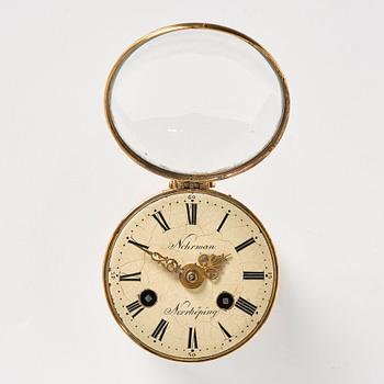 A gilt-brass travelling clock by E. Nohrman (active 1769-1779), with the monogram of Gustav III of Sweden, 1770's.