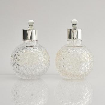 A Swedish pair of silver and cut-glass decanters, mark of C.G. Hallberg, Stockholm 1893.