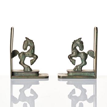 Carl-Einar Borgström, a pair of patinated bronze bookends, Ystad Brons, 1930-40s.