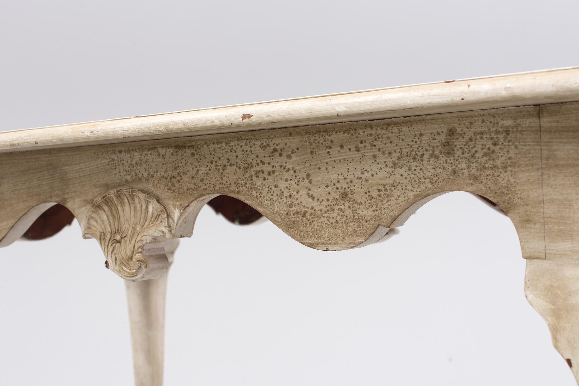 A first half of the 20th century rococo style table.