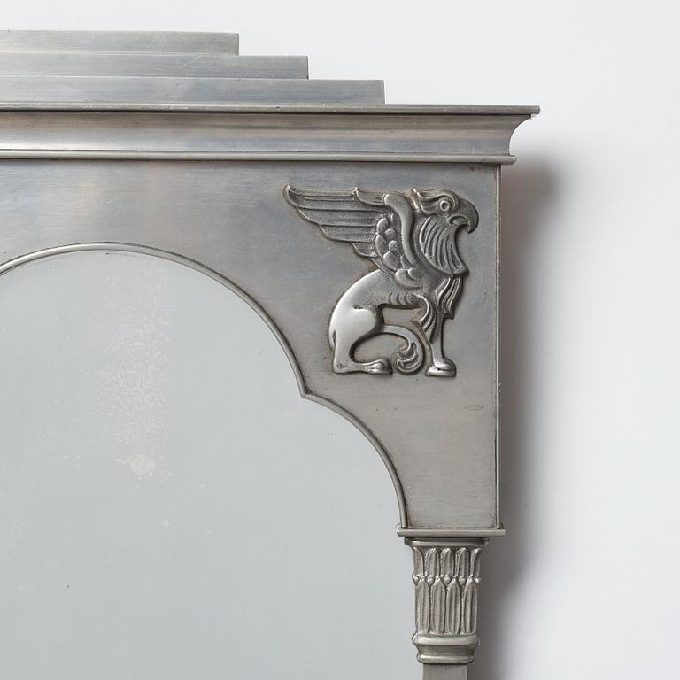 A Swedish Grace pewter framed mirror, signed Hj Bergman.