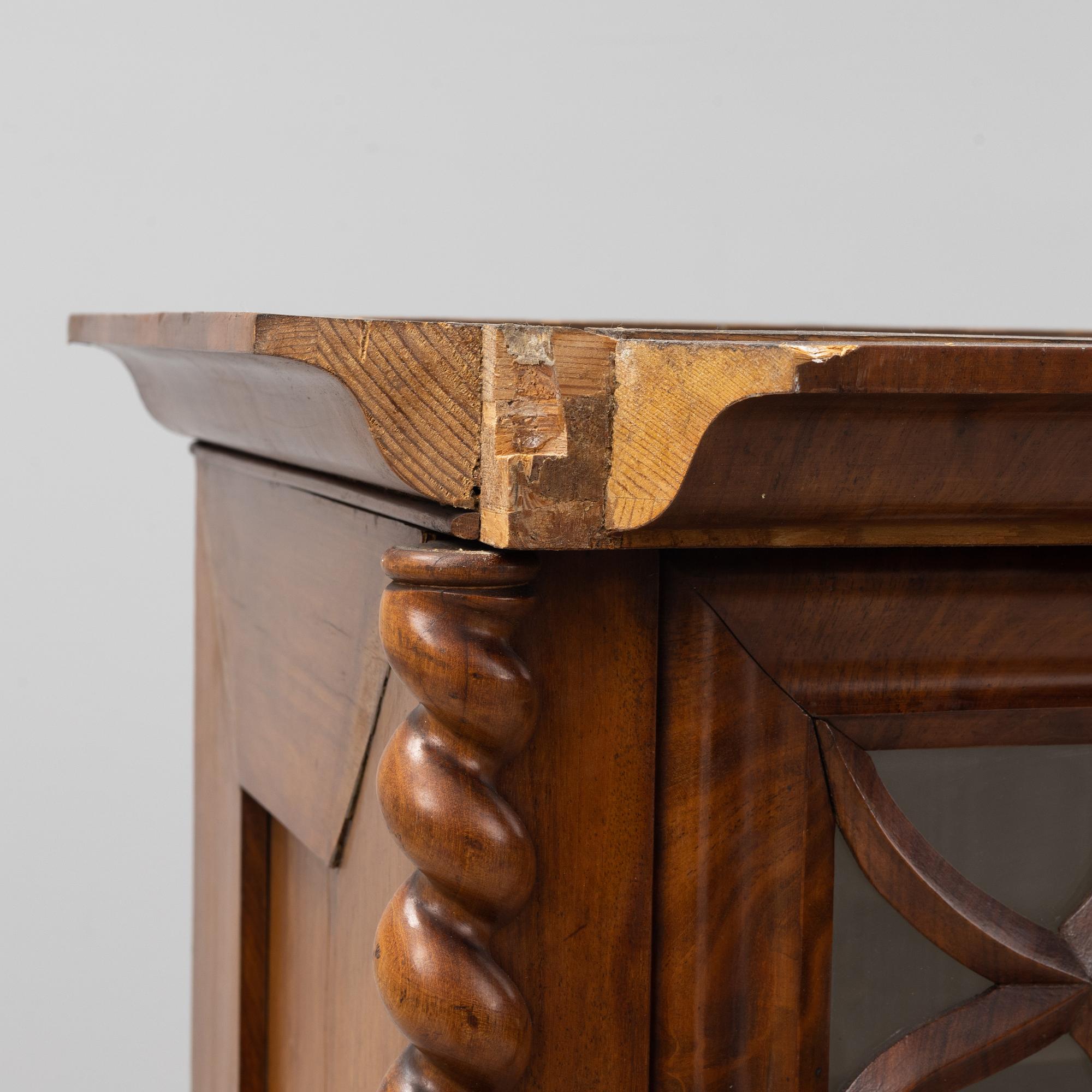 A mahogany veneered Gothic Revival cabinet, second half of the 19th Century.