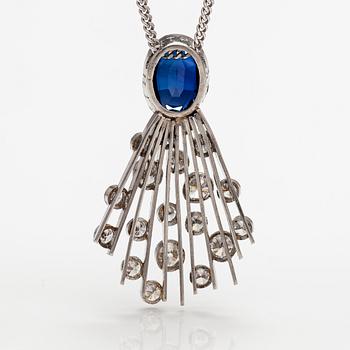 A platinum and 14K white gold necklace with a synthetic sapphire and diamonds ca. 1.10 ct in total.