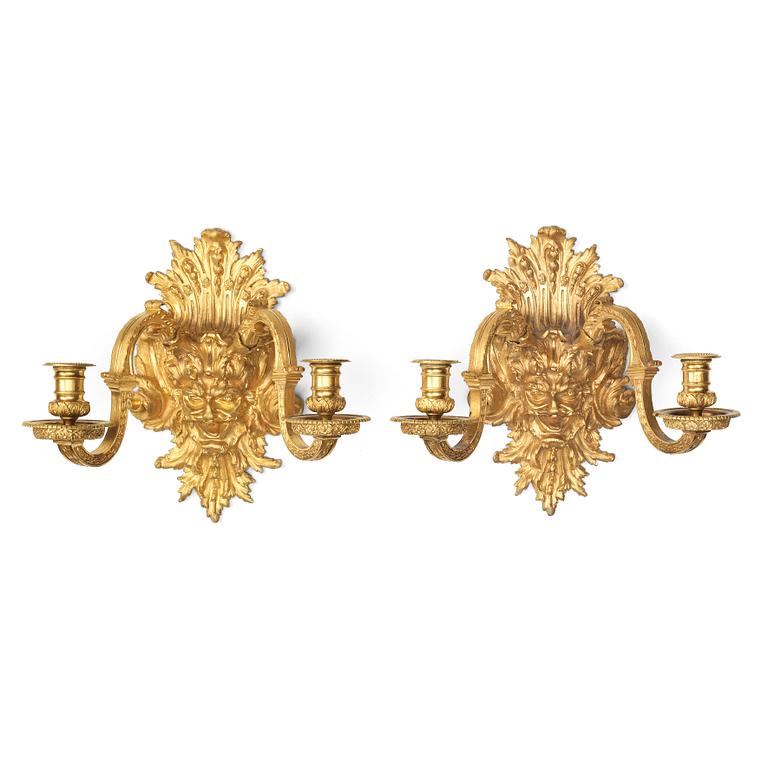 A pair of Baroque-style mid 19th century two-light wall-lights.