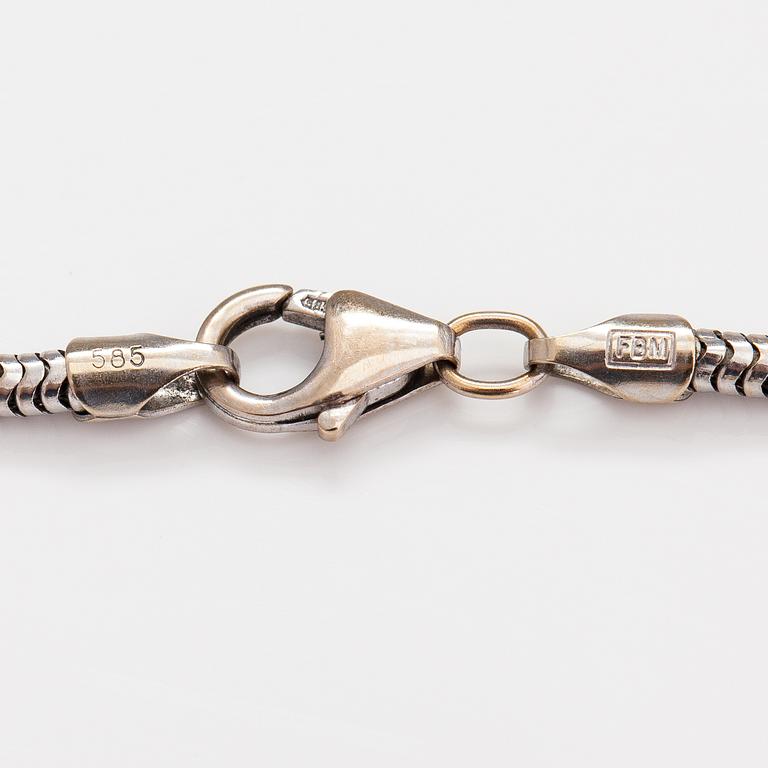 A 14K white and yellow gold bracelet with diamonds ca. 0.03 ct in total.