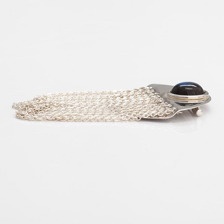 Elis Kauppi, A sterling silver brooch with a spectrolite. Kupittaan Kulta, Turku. Prototype.