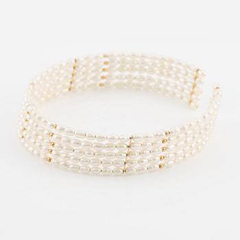 Five-row collar/choker with cultured freshwater pearls and 14K gold beads.