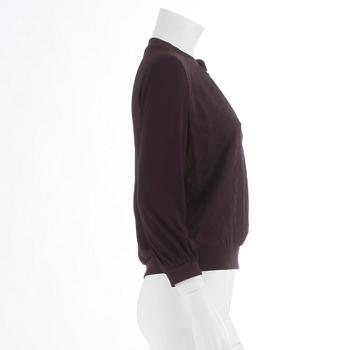 LOUIS VUITTON, a burgundy red monogrammed blouse, size 38.