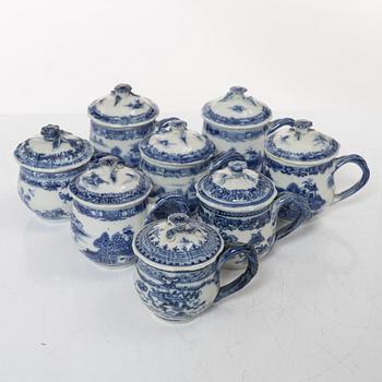 A group of eight Chinese blue and white porcelain custard cups with covers, Qing dynasty, Qianlong (1736-95).