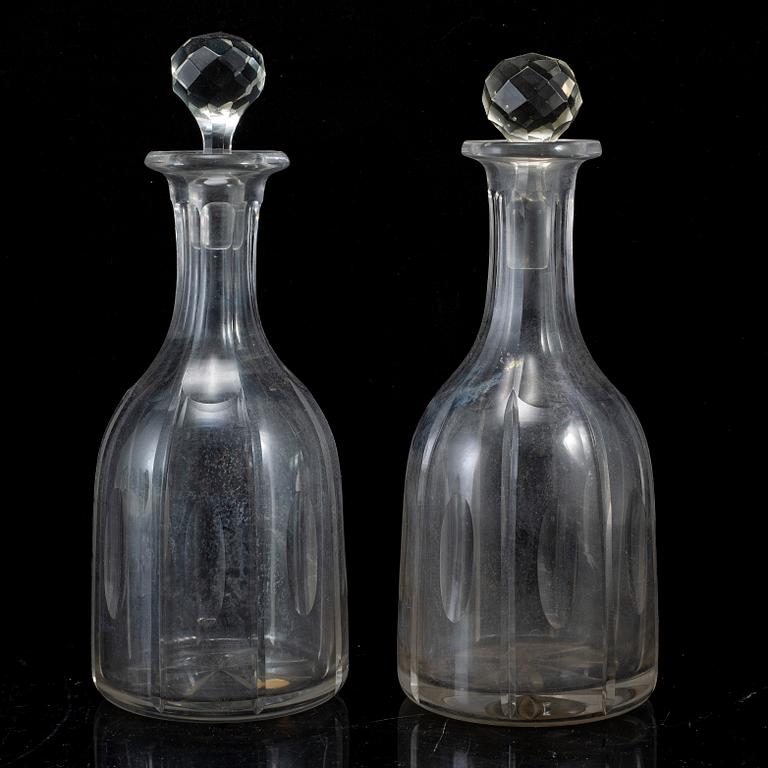 A set of four bottles with stoppers, 20th Century.