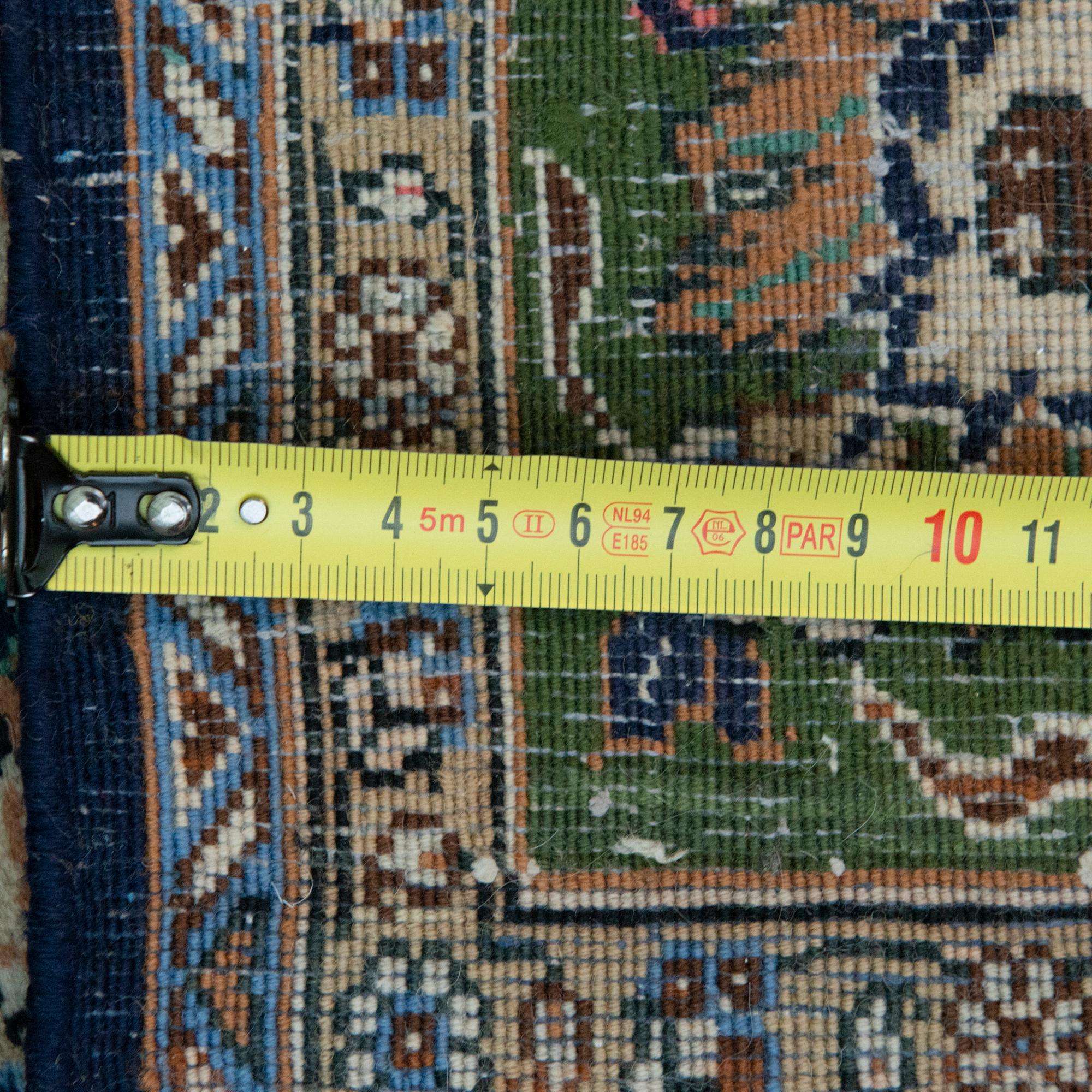 An oriental carpet. Qum. Circa 201x140 cm.