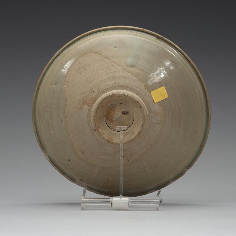 A carved celadon dish, Ming dynasty (1368-1644).