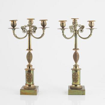 A pair of Empire style candelabra, circa 1900.