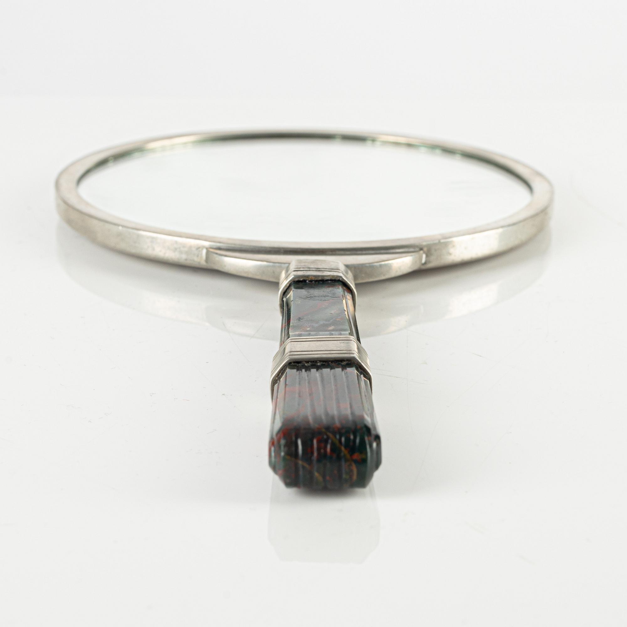 Swedish Grace, a pewter hand mirror, 1930s.