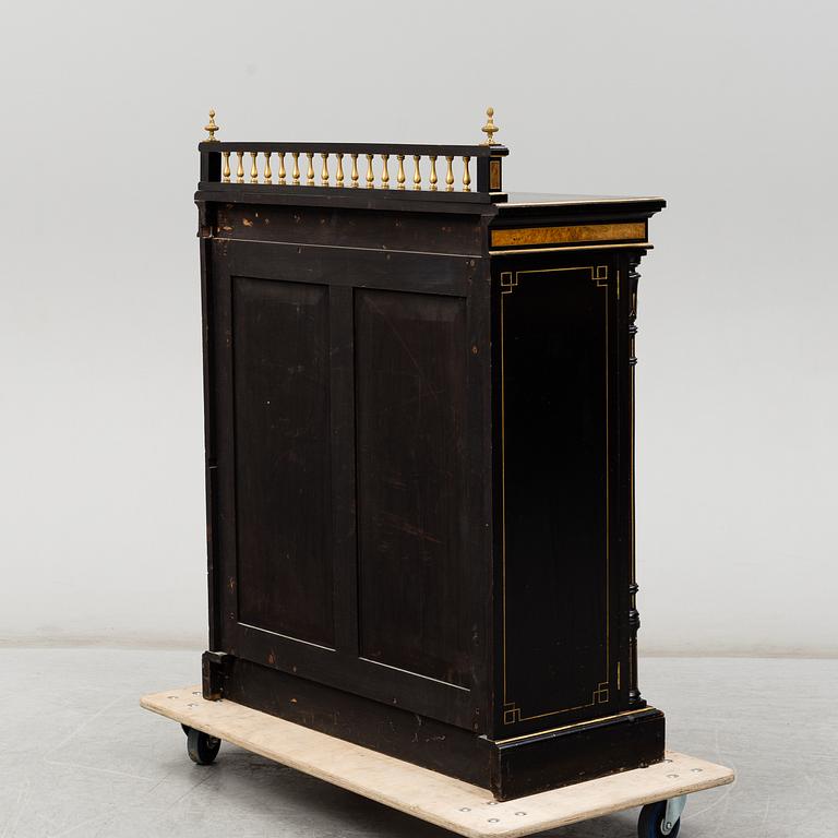 a late 19th Century show cabinet.