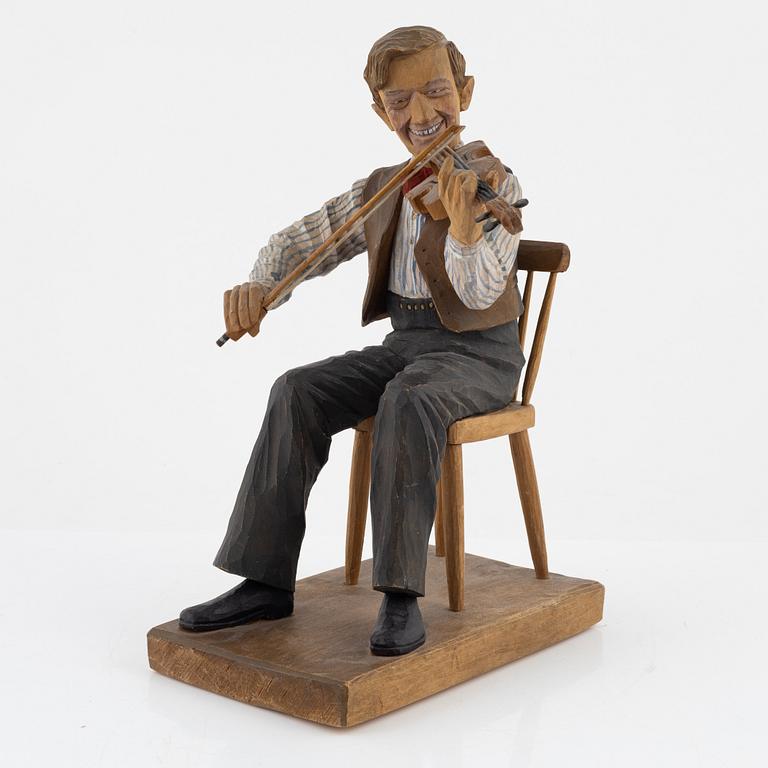 Herman Rosell, a carved and painted wood sculpture, signed HR and dated 1945.