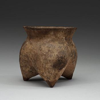 A grey earthenware 'li' tripod, Neolithic, circa 1500 BC.
