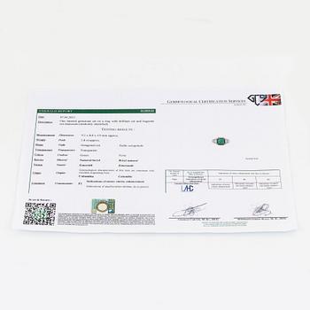 A Bulgari "Trombino" ring in platinum set with a step-cut emerald and round brilliant- and baguette-cut diamonds.