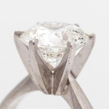 A platinum ring, with a brilliant-cut diamond approximately 3.10 ct. Domino Jewellery, Birmingham, England.