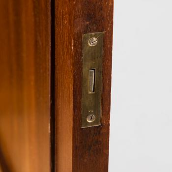 An Art Déco mahogany cabinet.