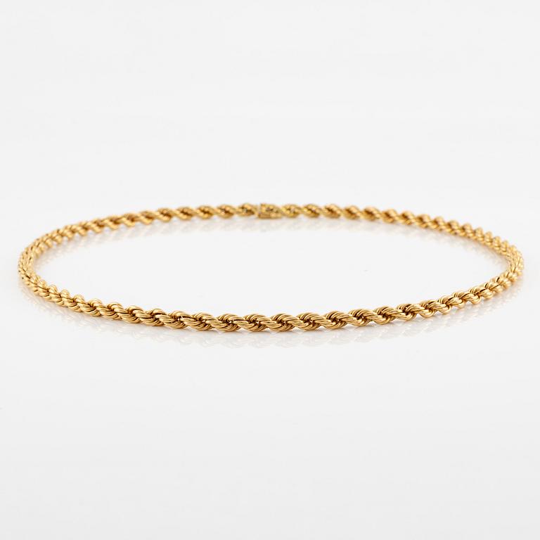 An 18K gold chain.