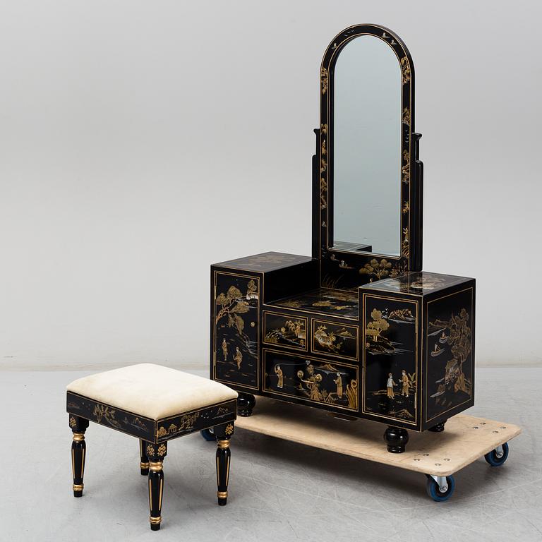 A Chinese lacquered dressing table and stool, 20th century.