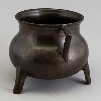 A medieval bronze pot.