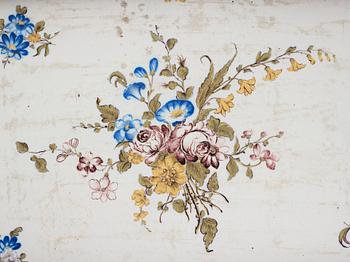 A Swedish Rococo faience tea table, dated 1774.