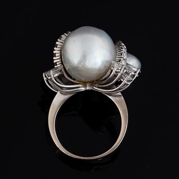 Baroque pearl and navette-cut and brilliant-cut diamond ring.