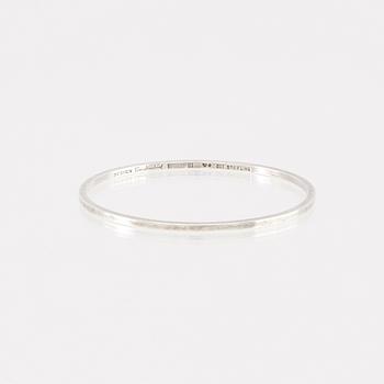 Elon Arenhill, armringar 2 st silver, Malmö 1964 och 1991.