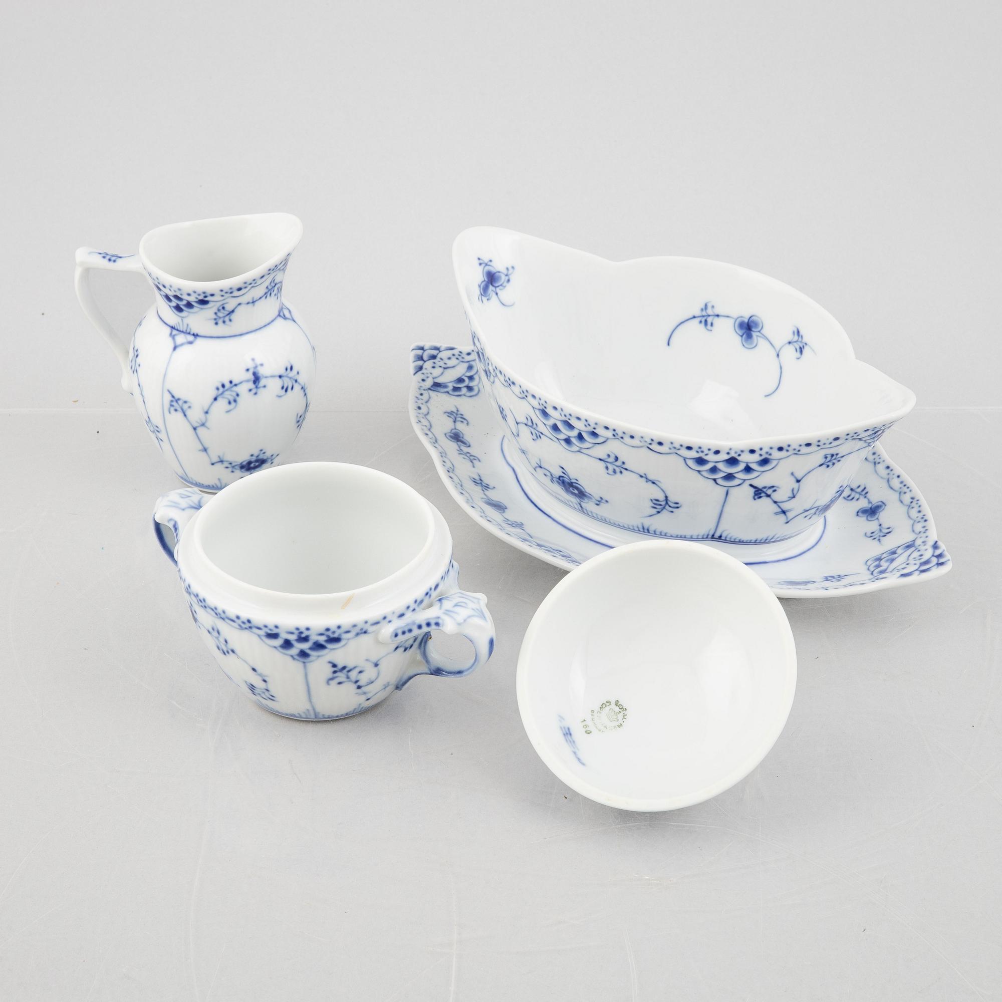 An 80-piece 'Blue Fluted' porcelain dinner and coffee service, Royal Copenhagen, Denmark.