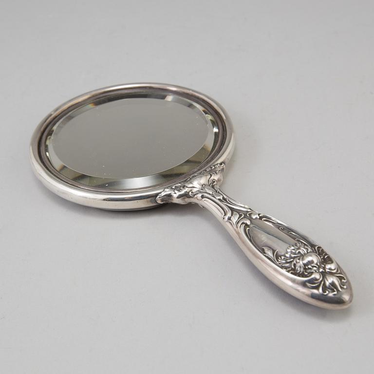 A sterling silver mirror from around year 1900.