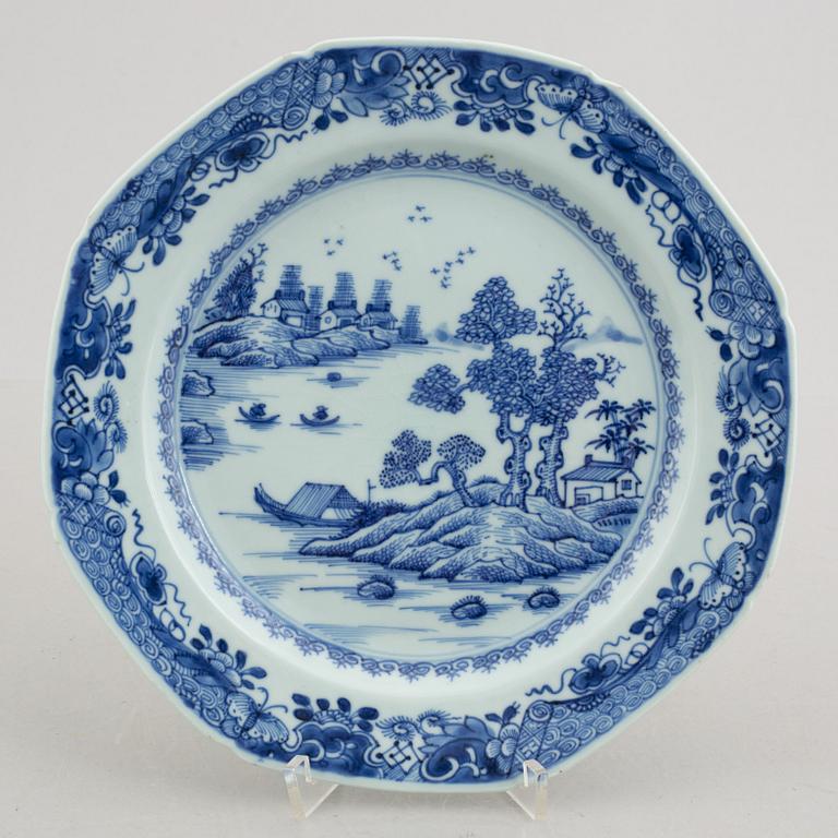 Three blue and white plates and a serving dish, China, Qianlong (1736-95).