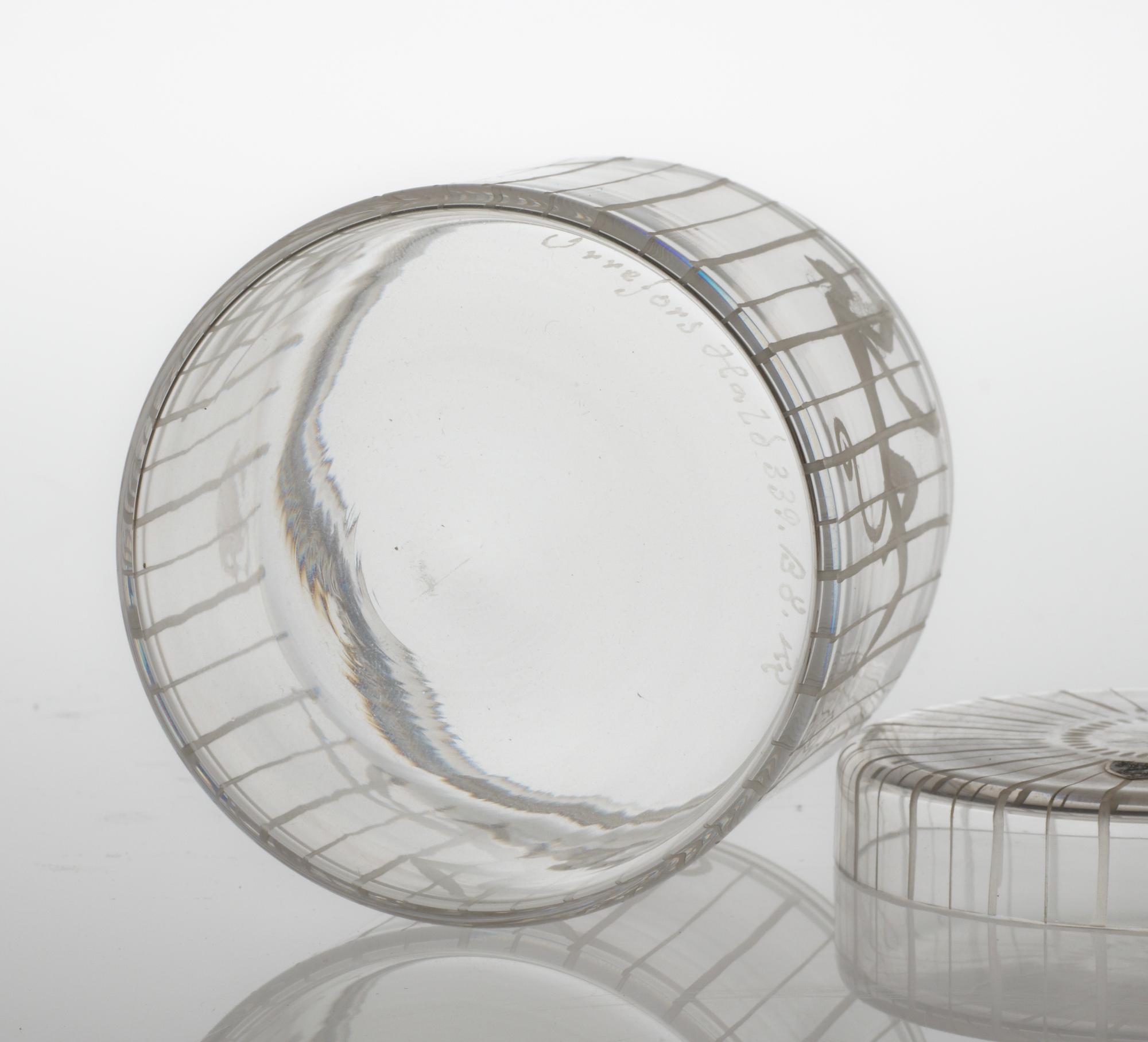 An Edward Hald engraved glass jar with cover, Orrefors 1951.