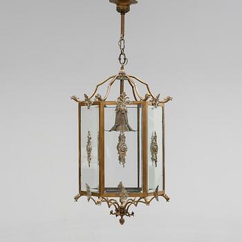 TAKLYKTA, mässing, 1900-talets första hälft. Höjd ca 70 cm.