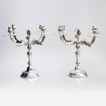 A pair of German 18th century silver candelabras, mark of C.C. Papcke, Stralsund.
