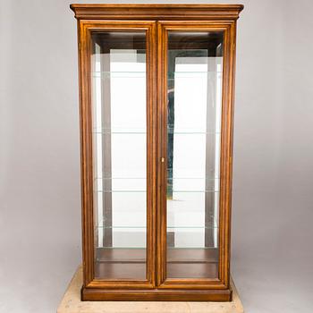 A late 20th century display cabinet.