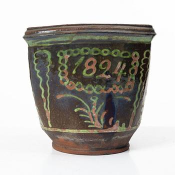 Stoneware planter and stand, dated 1824.