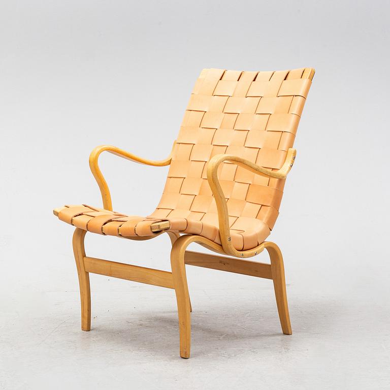 An 'Eva' easy chair by Bruno Mathsson for Firma Karl Mathsson dated 1971.