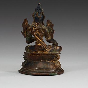 A Sinotibetan gilt bronze figure of green Tara, 18th/19th Century.