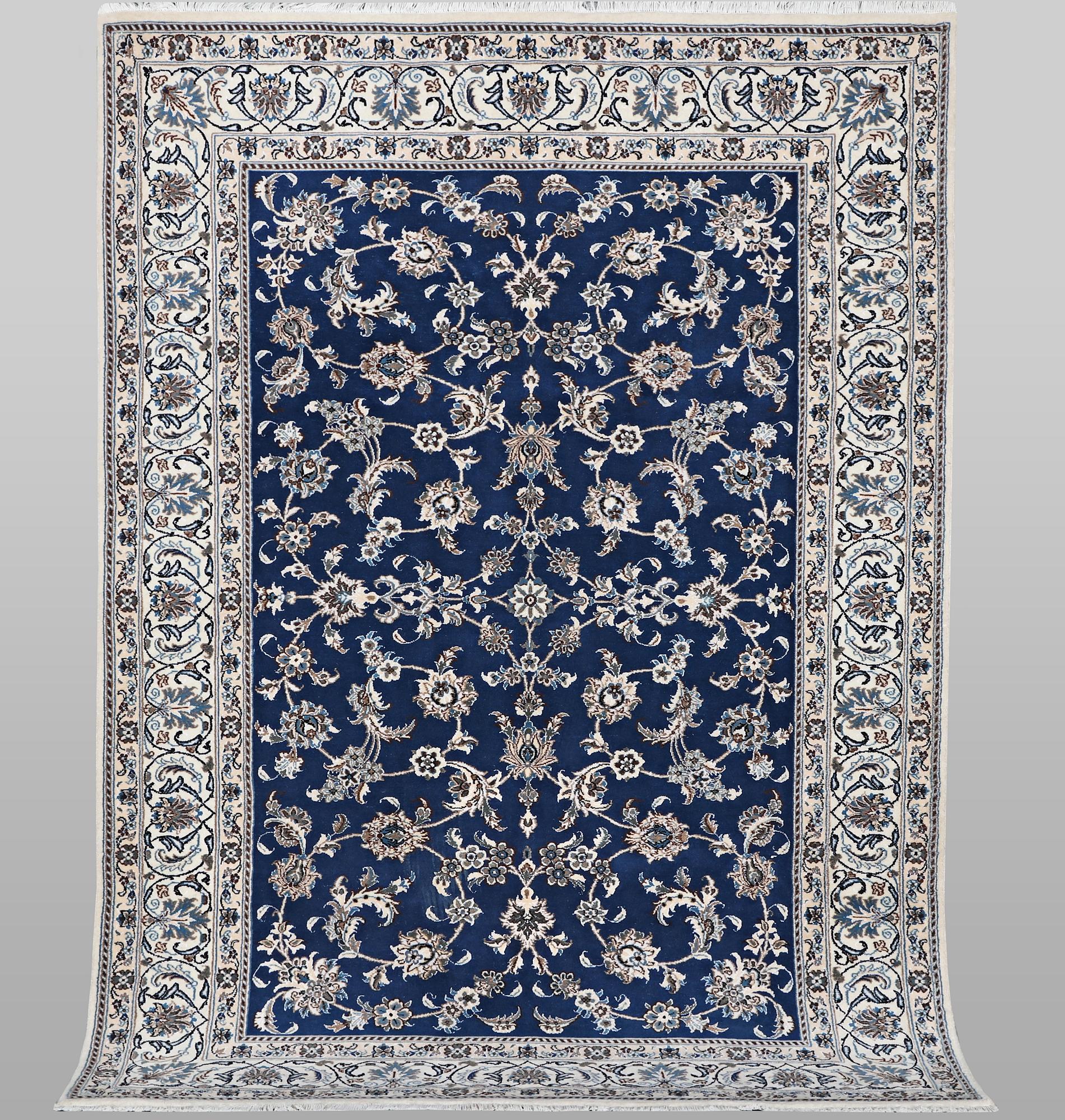 A carpet, Nain, part silk, ca 297 x 194 cm.