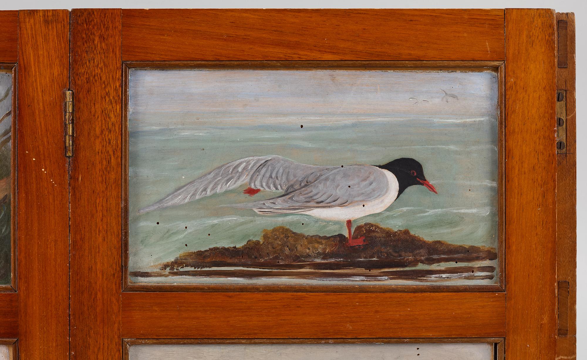 A folding screen, late 19th century.