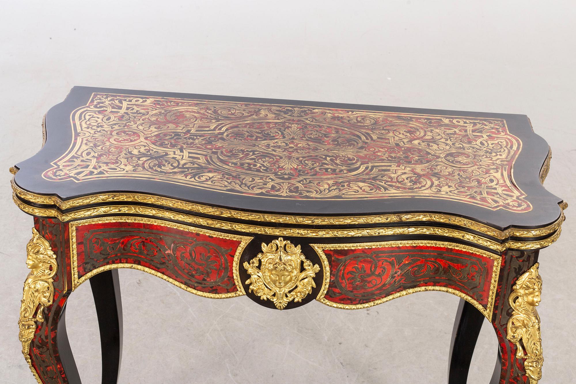 A late 20th century card table in Boulle-style.
