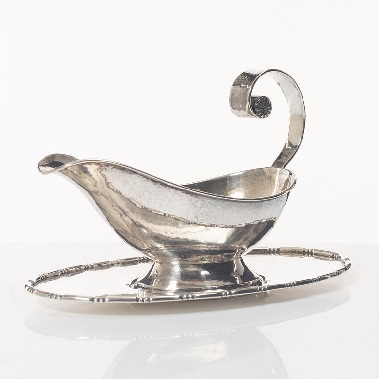 A Swedish silver sauce boat, marks of C.G. Hallberg, Stockholm 1926.