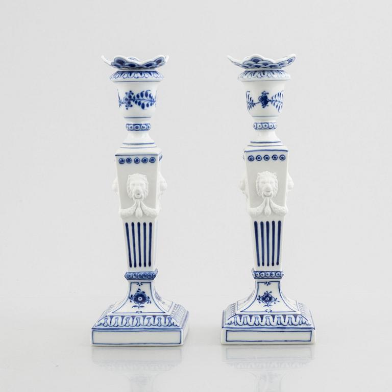 A pair of 'Blue Fluted' / 'Musselmalet' porcelain candle sticks, Royal Copenhagen, model 15, 1960's/70's.