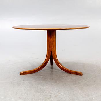 A Josef Frank walnut root coffee table, model 1028, Firma Svenskt Tenn, second half of the 20th century.