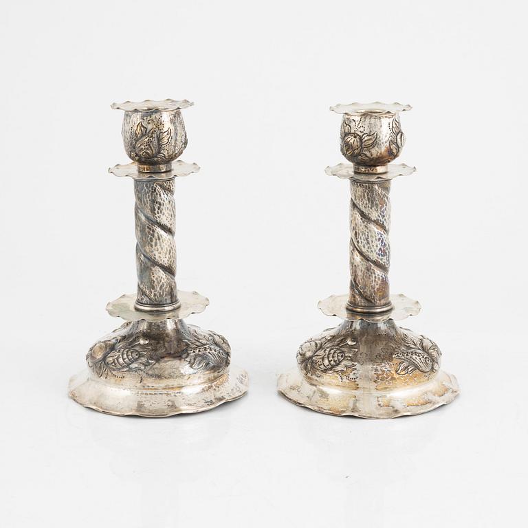 A pair of Baroque style silver candle sticks, Råströms Silver- O Nysilverfabrik, Stockholm, 1947.